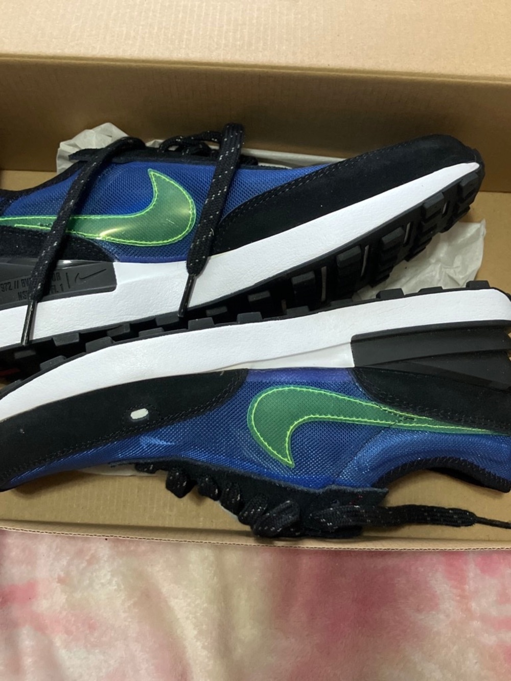Green and Blue nike shoes